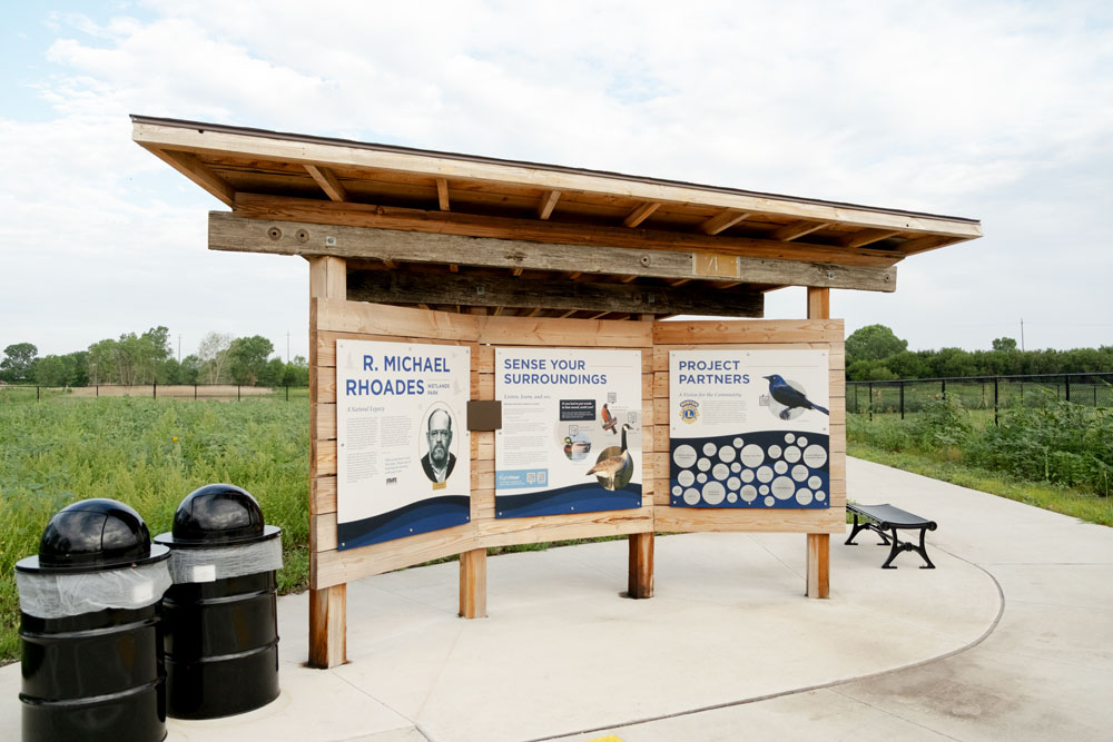 Informational signage for a wetlands park in Newton, KS. All signs incorporate a braille panel and the sign structures incorporate hardware and software for compatibility with the RightHear app for visually impaired visitors.